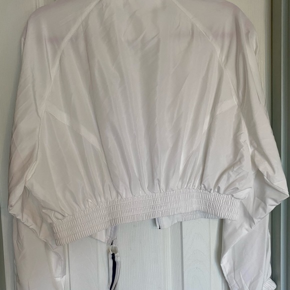 A Love Tree Junior wind breaker, white, size medium and crop style. - Picture 2 of 3